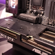 Asus and MSI offer convenient mechanisms for removing graphics cards from motherboards