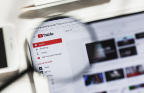 YouTube is testing experimental features: video search with Google Lens, channel QR codes, and AI chat summaries
