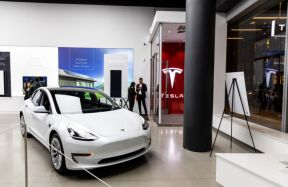 Tesla quarterly financial report: net income $7.9 billion. 2024 growth rate 'could be significantly lower'