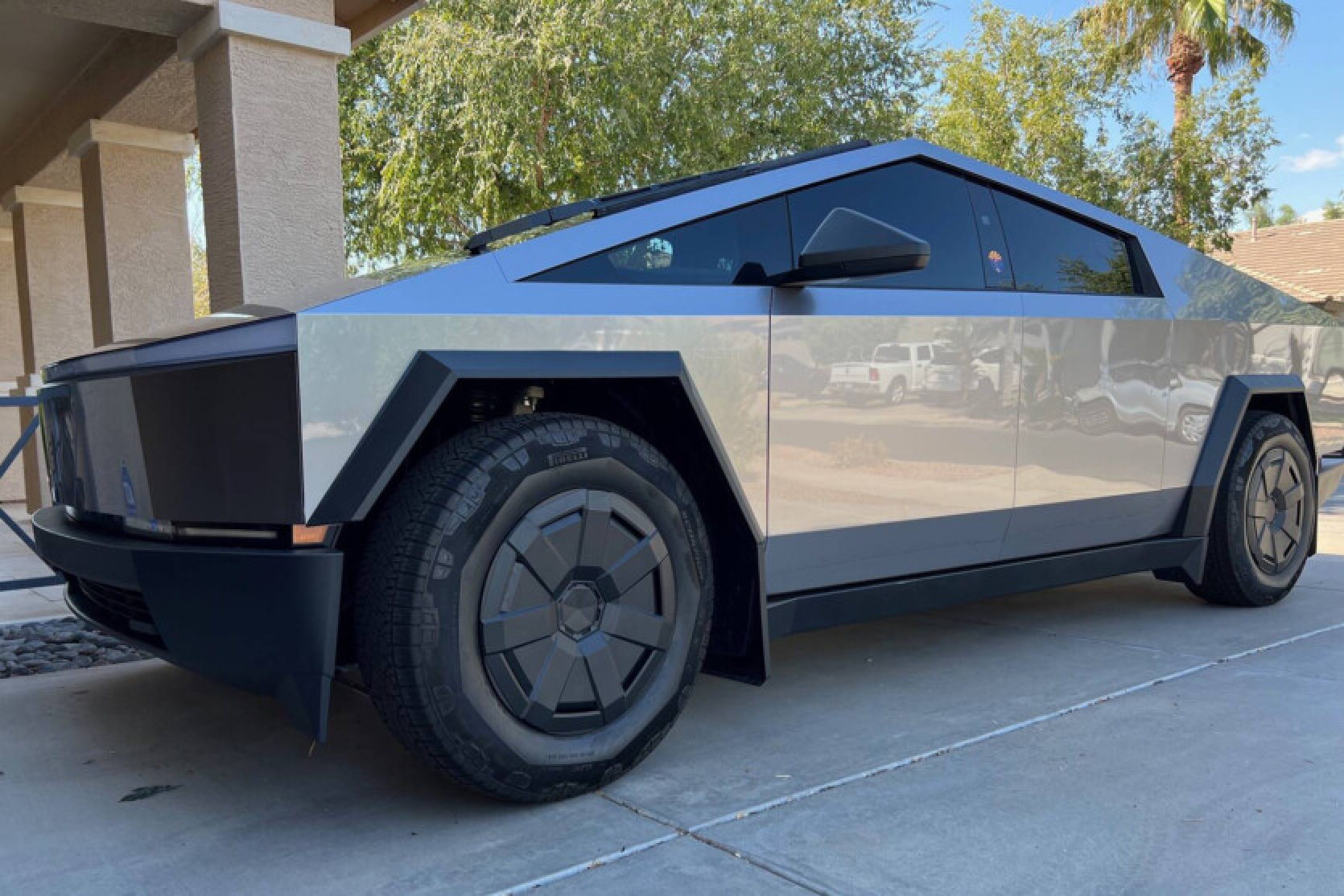 The $4200 Tesla Cybertruck with the $4200 cover looks the same as without - why the owner did it